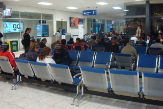 a group of people sitting in a waiting room