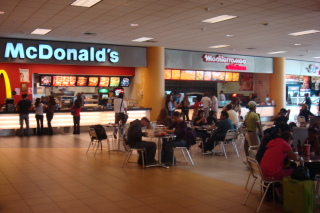 people eating at a fast food restaurant