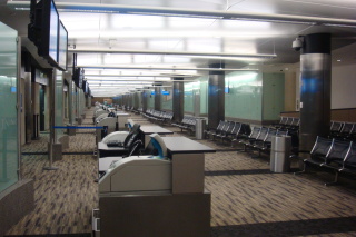 a row of chairs in an airport