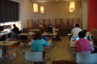 a group of people sitting at desks