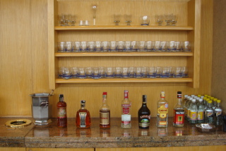 a row of bottles of alcohol on a counter