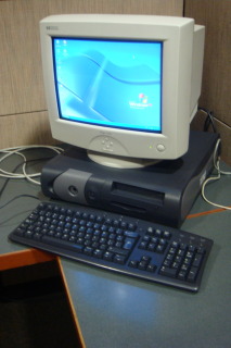 a computer monitor and keyboard