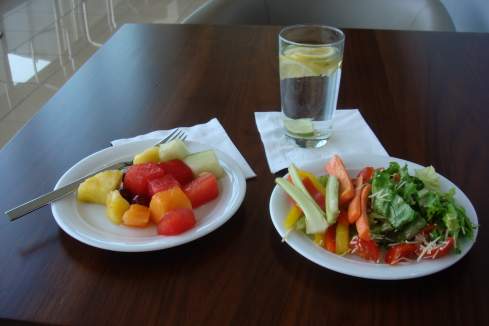 a plate of fruit and vegetable salad