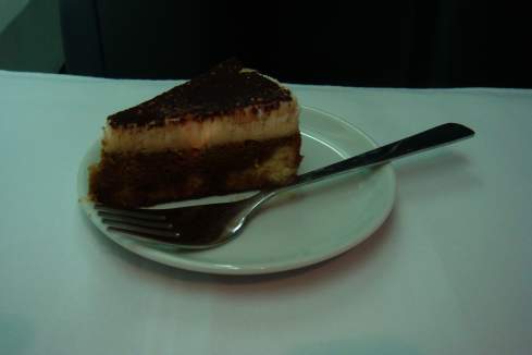 a piece of cake on a plate with a fork