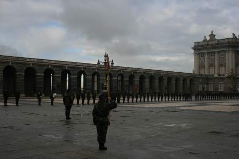 a group of soldiers in front of a building