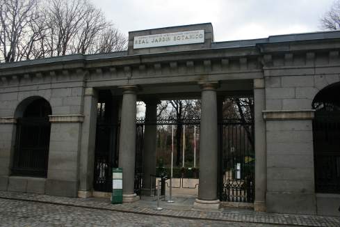 a stone gated entrance to a park