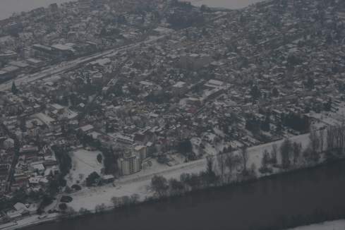 aerial view of a city with snow