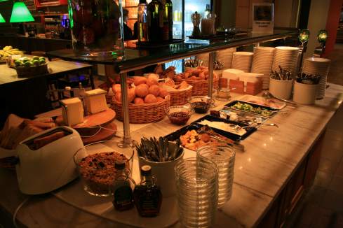 a buffet table with food and drinks