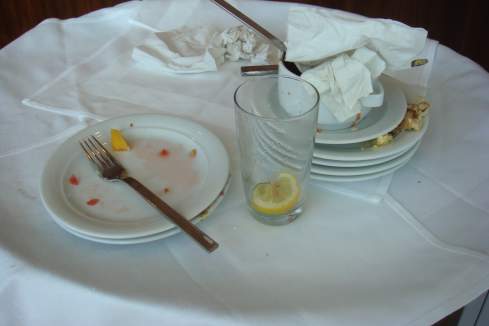 a plate and a glass on a table