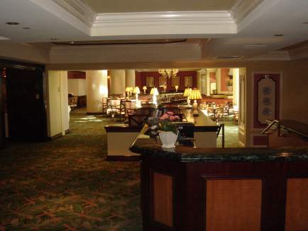 a hotel lobby with a large counter