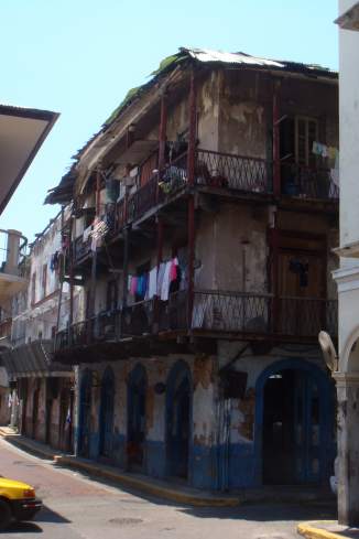 a building with balconies and clothes out