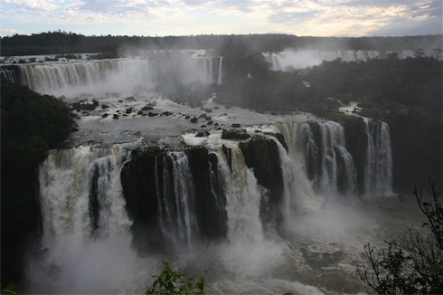 a large waterfall with water flowing down