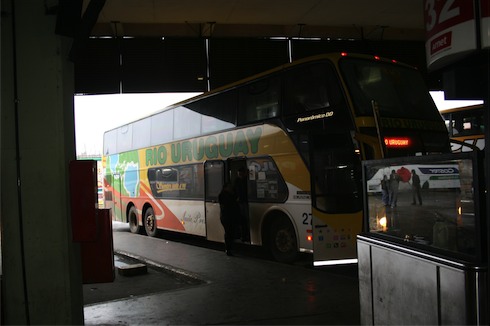 a double decker bus in a garage