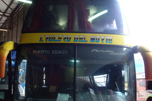 a bus with a yellow stripe