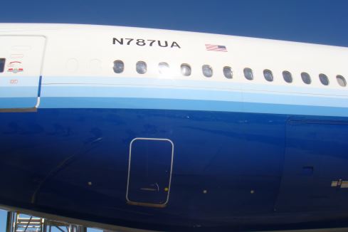 close-up of a blue and white airplane