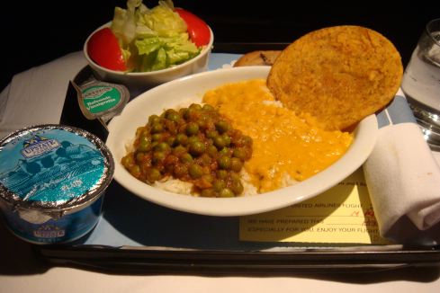 a plate of food on a tray