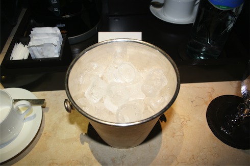 a bucket of ice on a counter