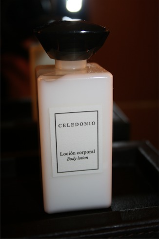 a white bottle of body lotion