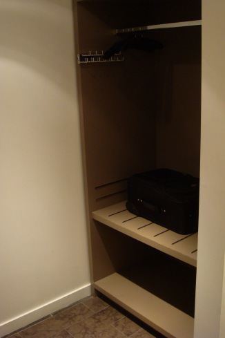 a suitcase inside a closet