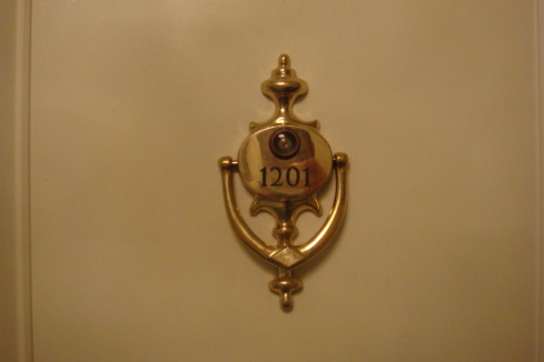 a door knocker with a number on it