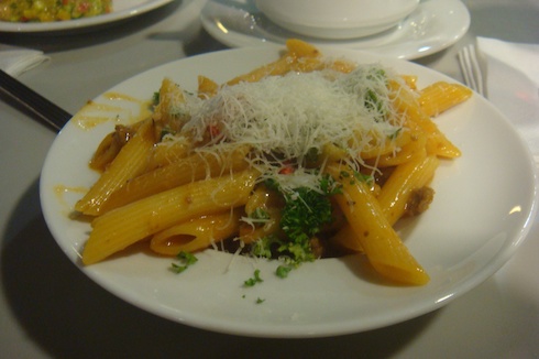 a plate of pasta with cheese