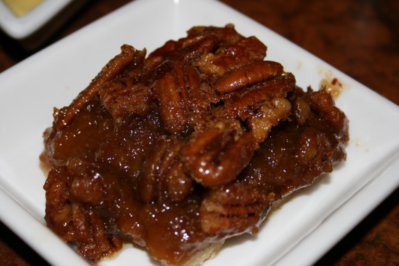 a plate of pecan pie