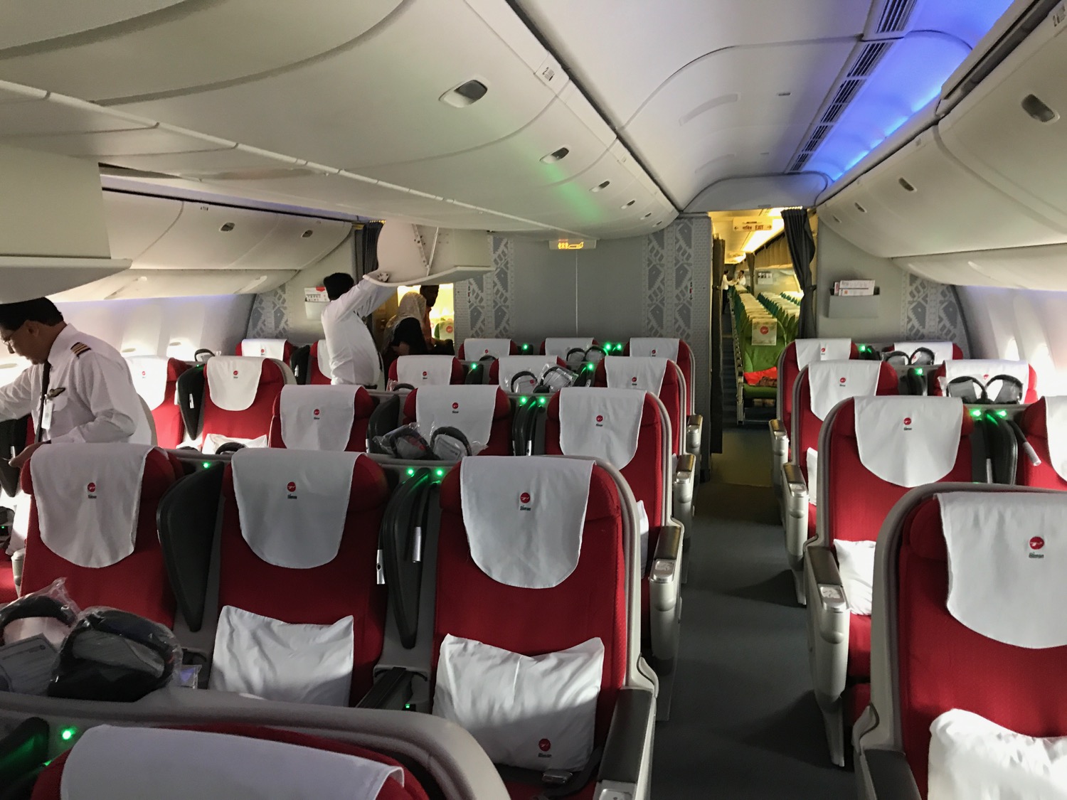 an airplane with red seats and white seats