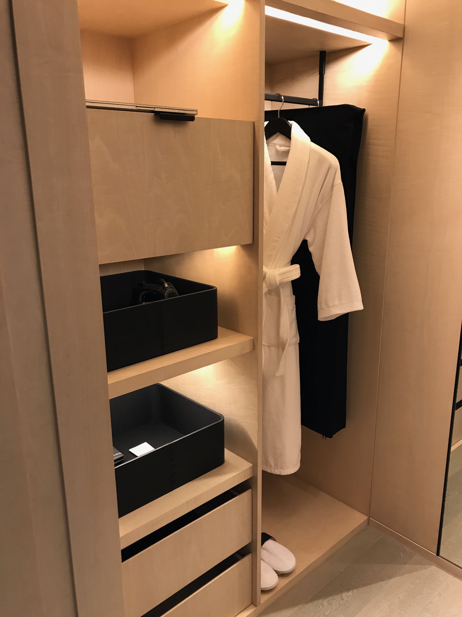 a white robe in a closet