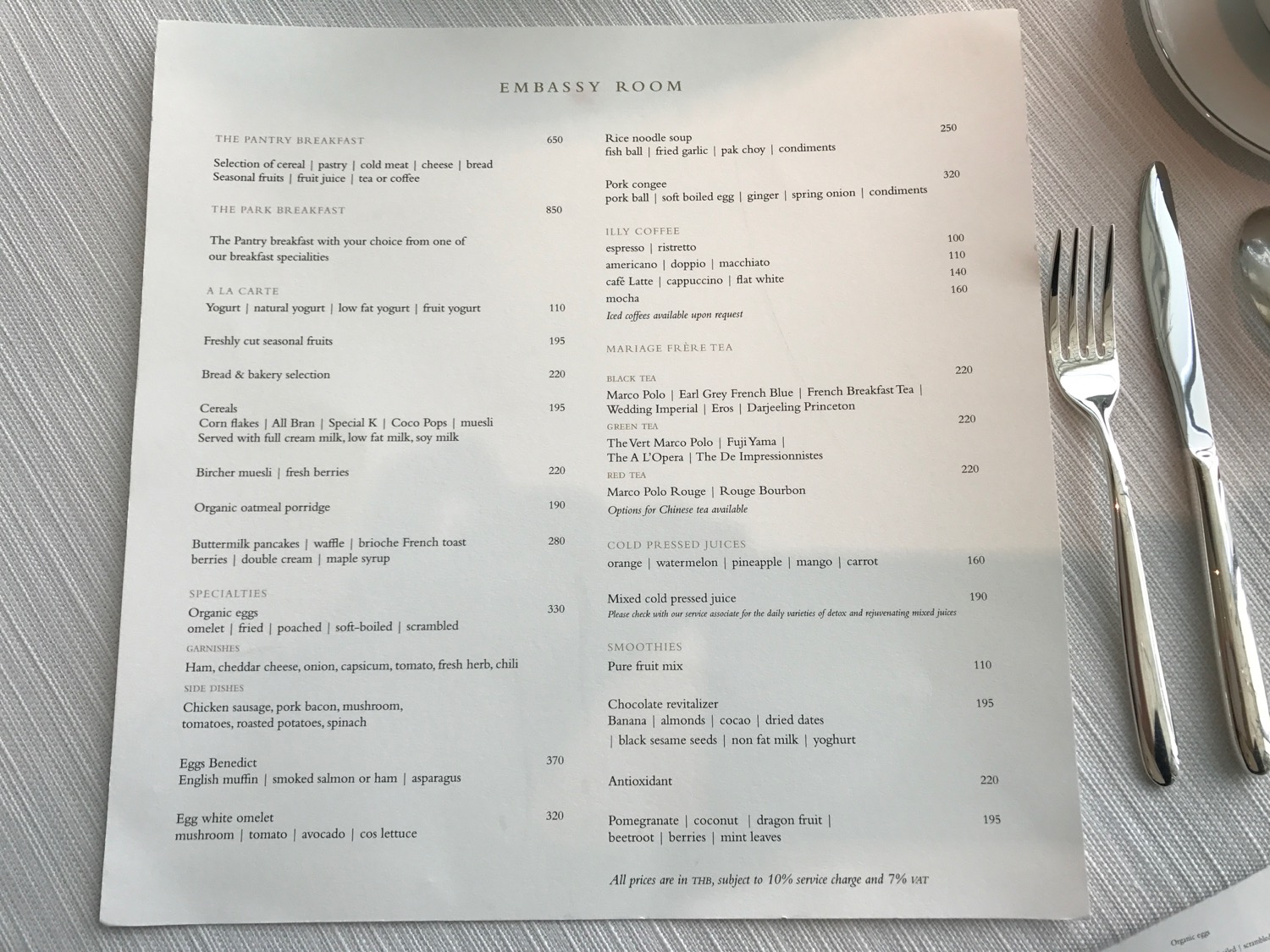 a menu with a fork and knife