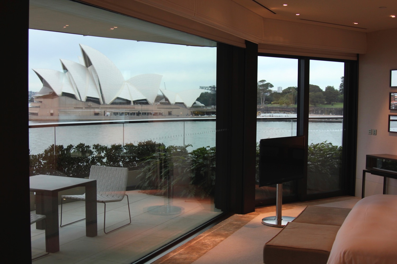 a room with a view of the opera house and a large building