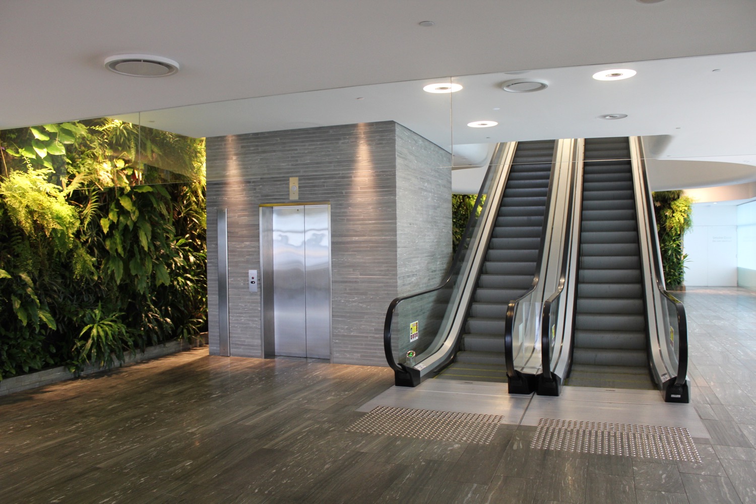 an elevator with an escalator