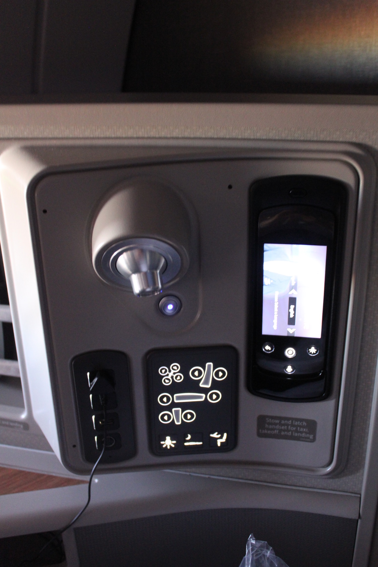 a phone and control panel on a vehicle