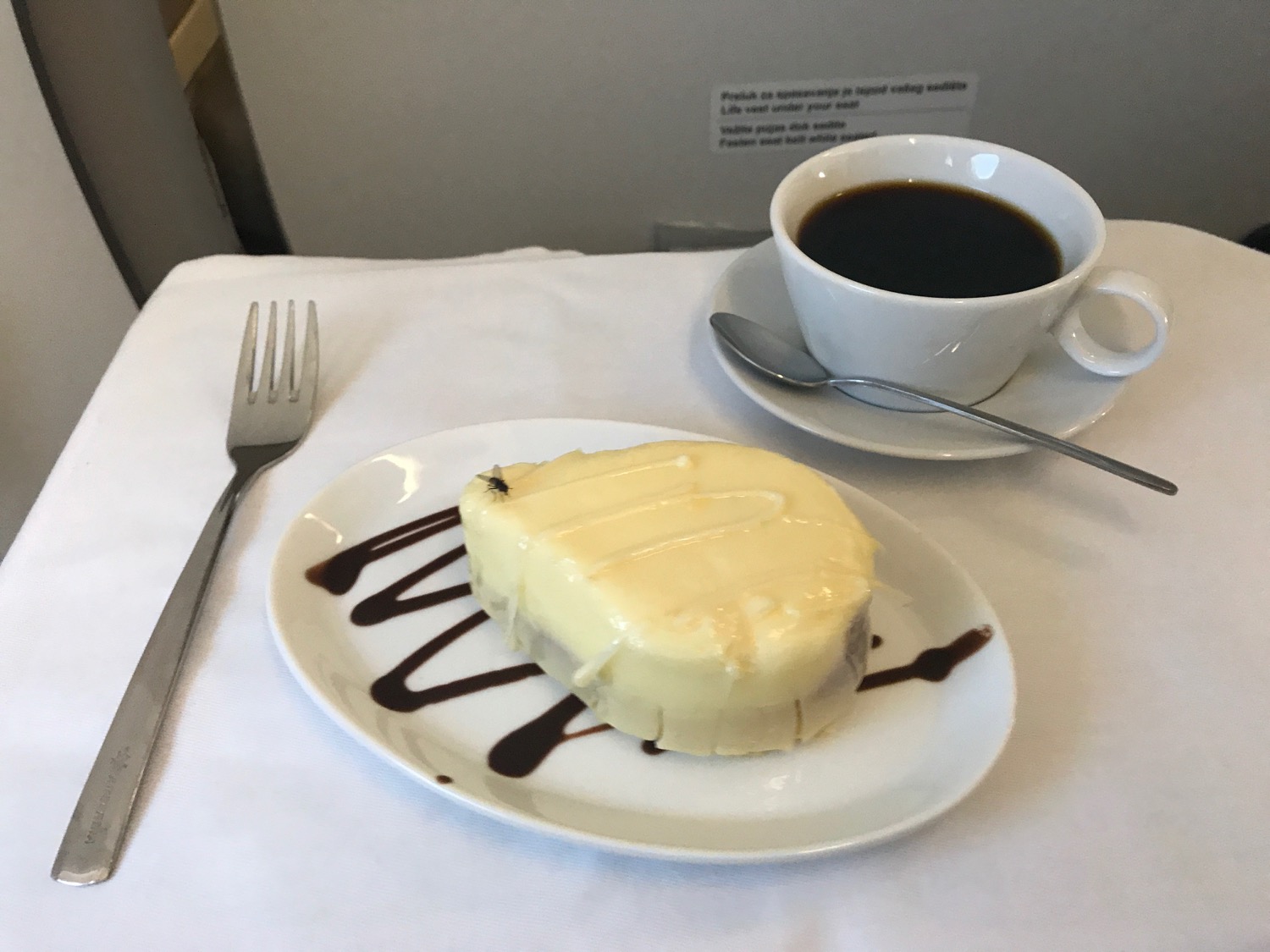 a plate of dessert and a cup of coffee