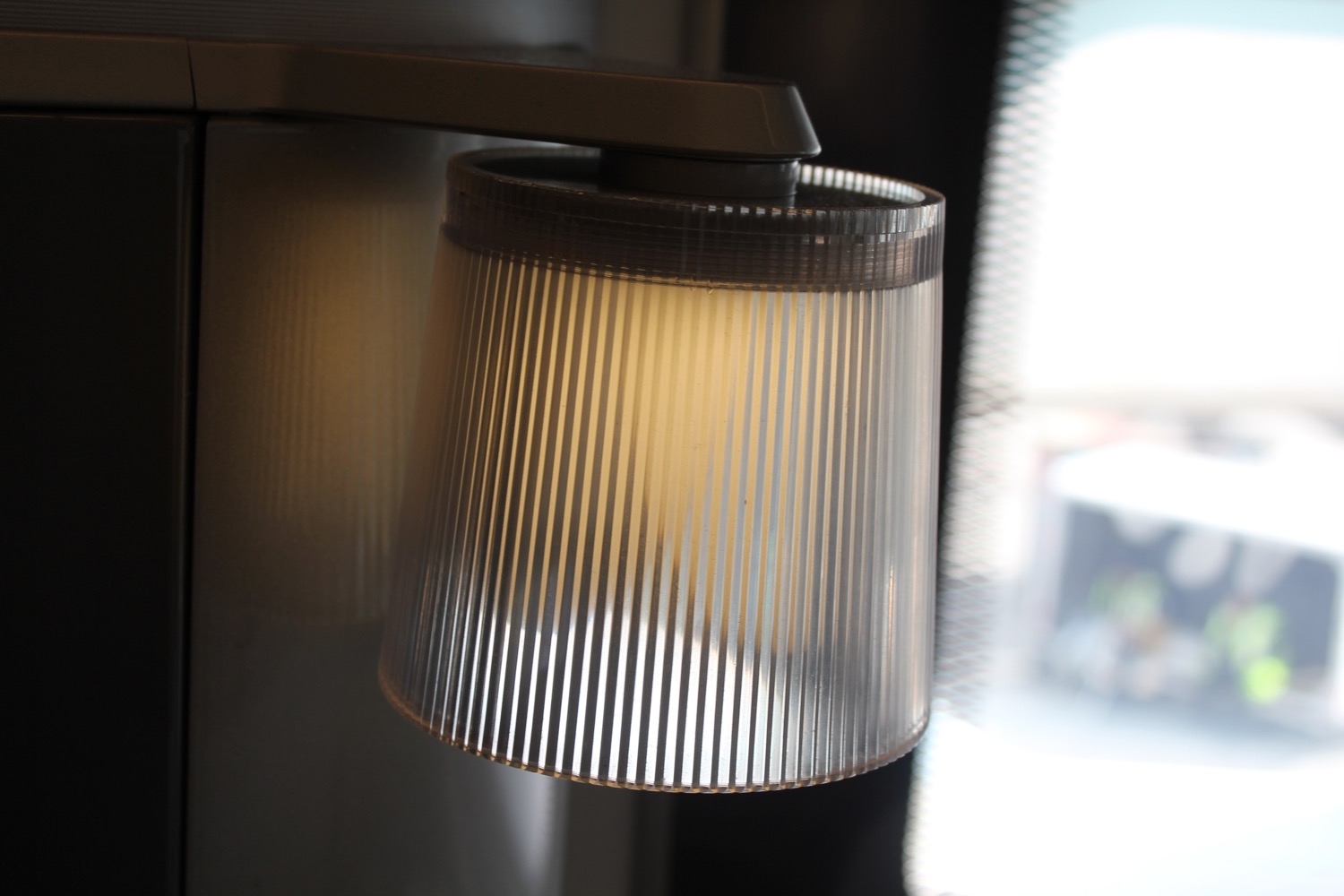 a light fixture with a clear shade