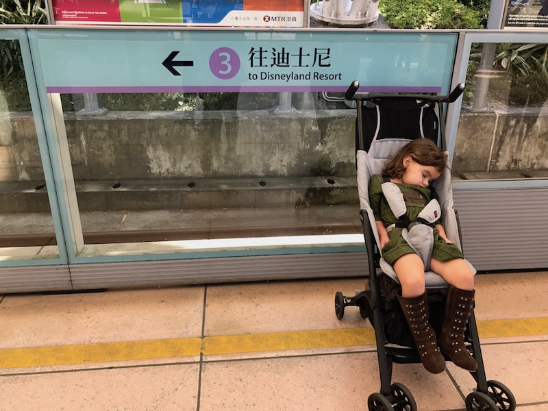 a child sleeping in a stroller