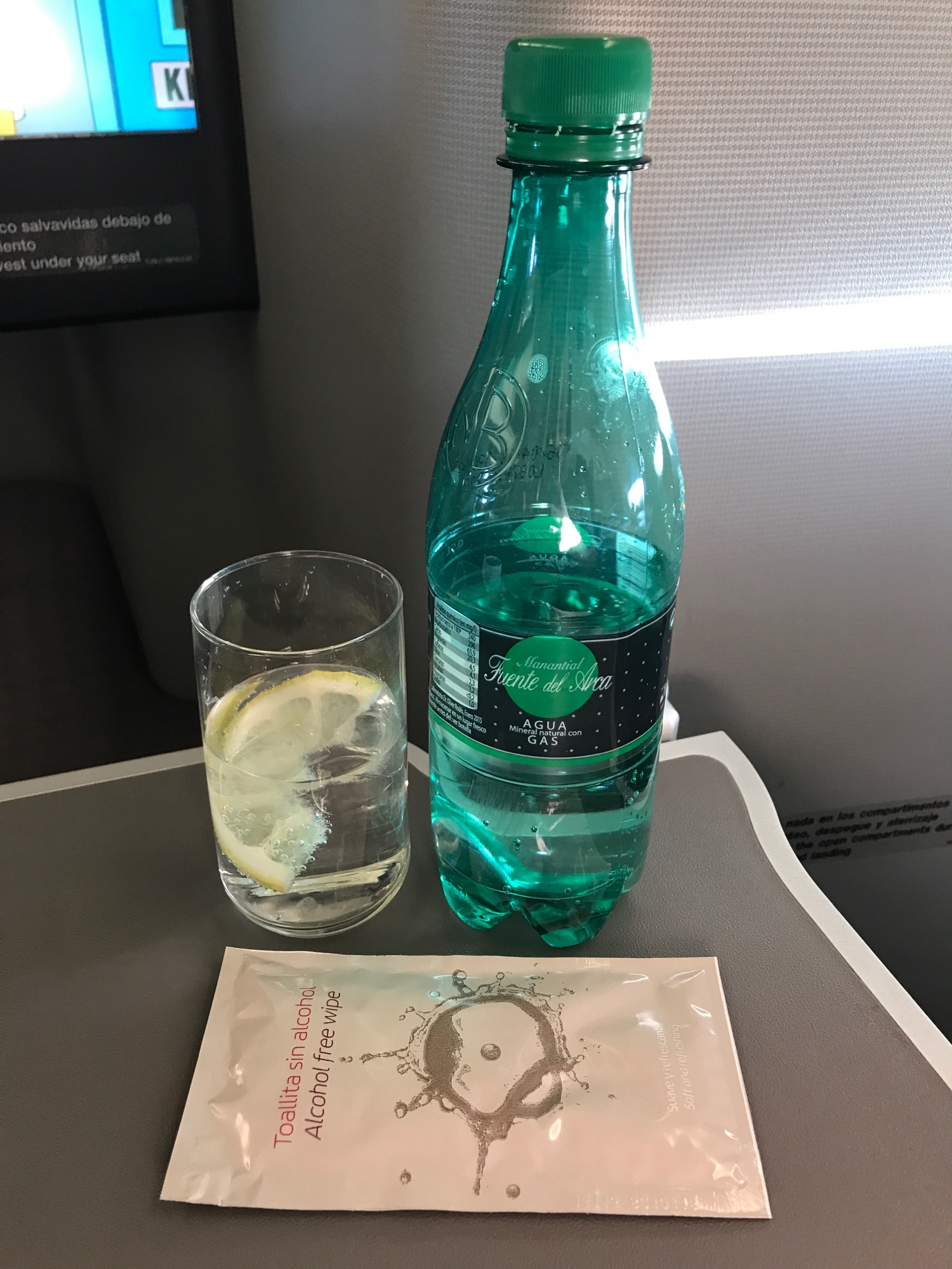 a bottle and glass of water