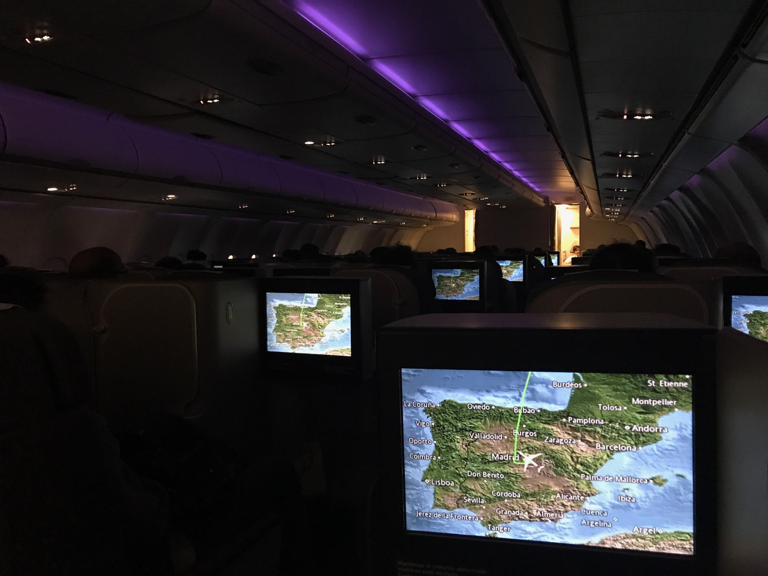 a televisions on the seats of an airplane
