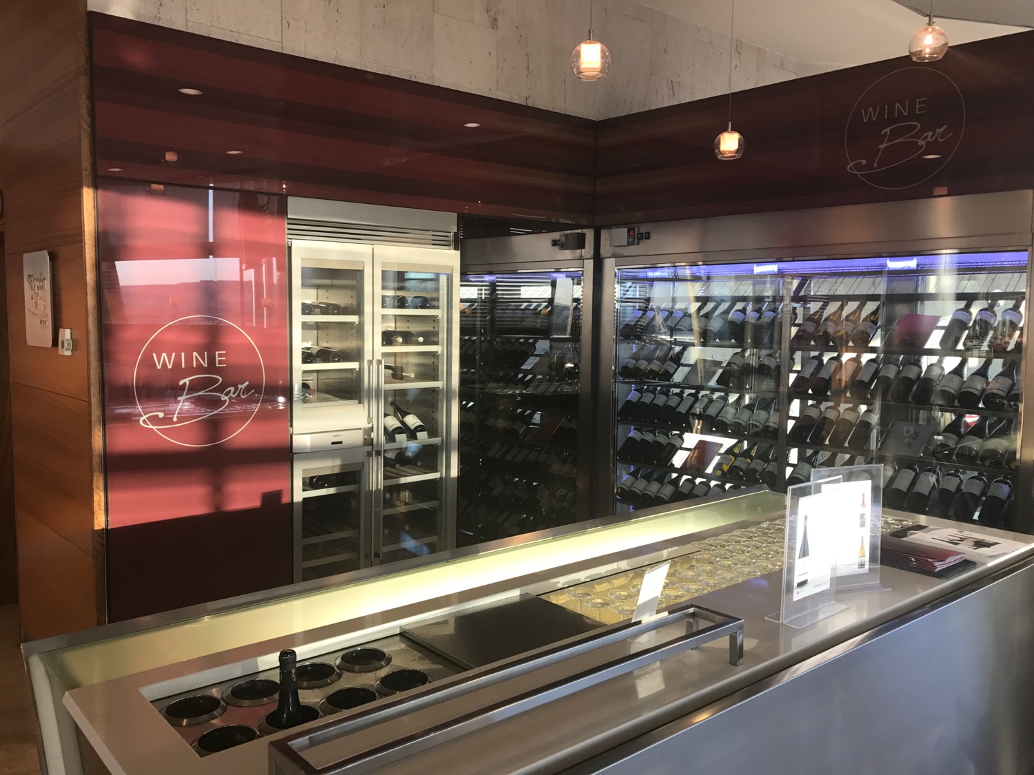 a wine cellar with shelves of wine