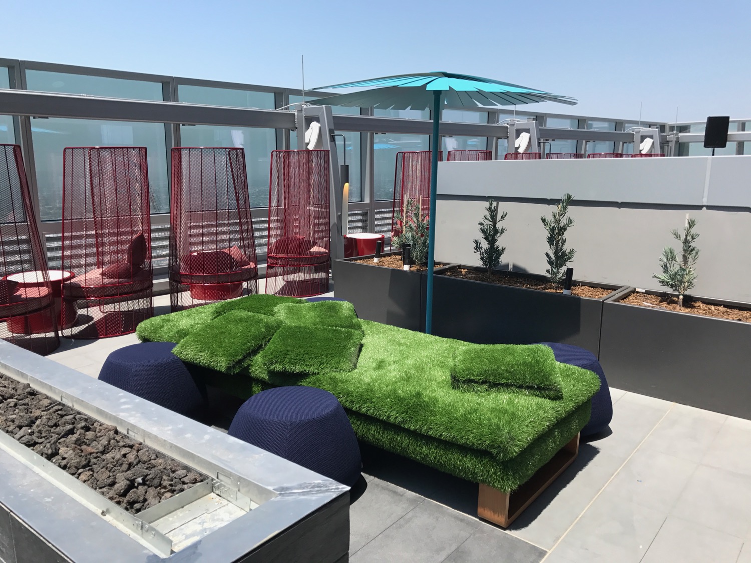 a green couch on a rooftop