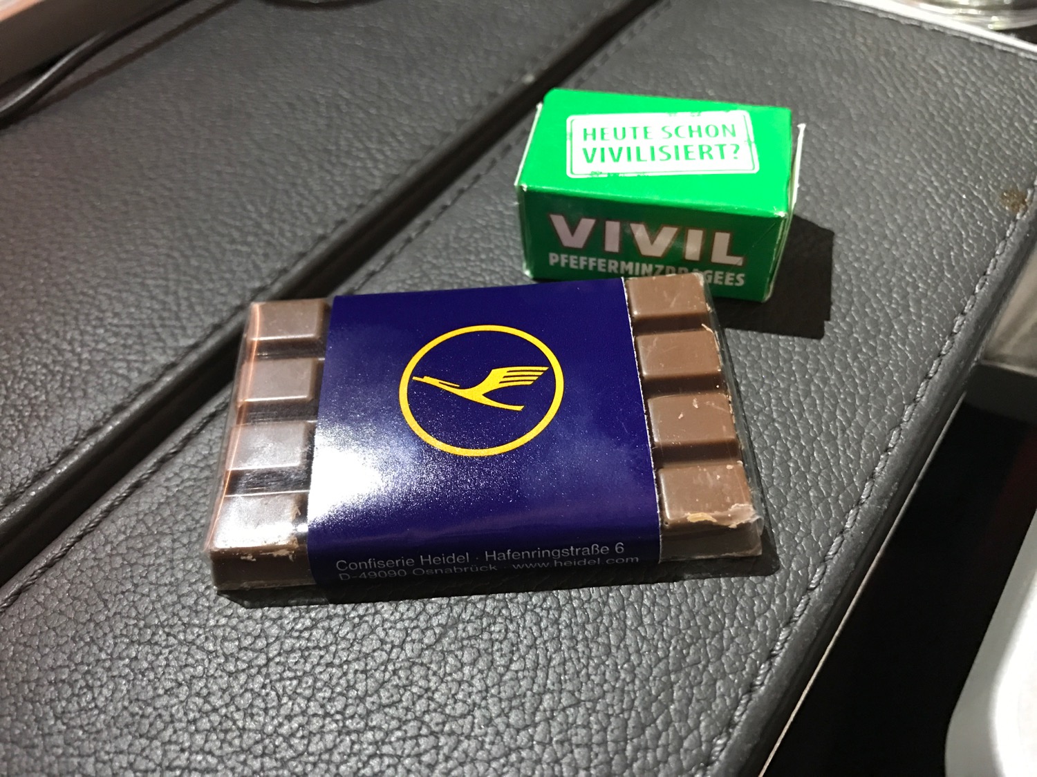 a chocolate bar and a small box of candy