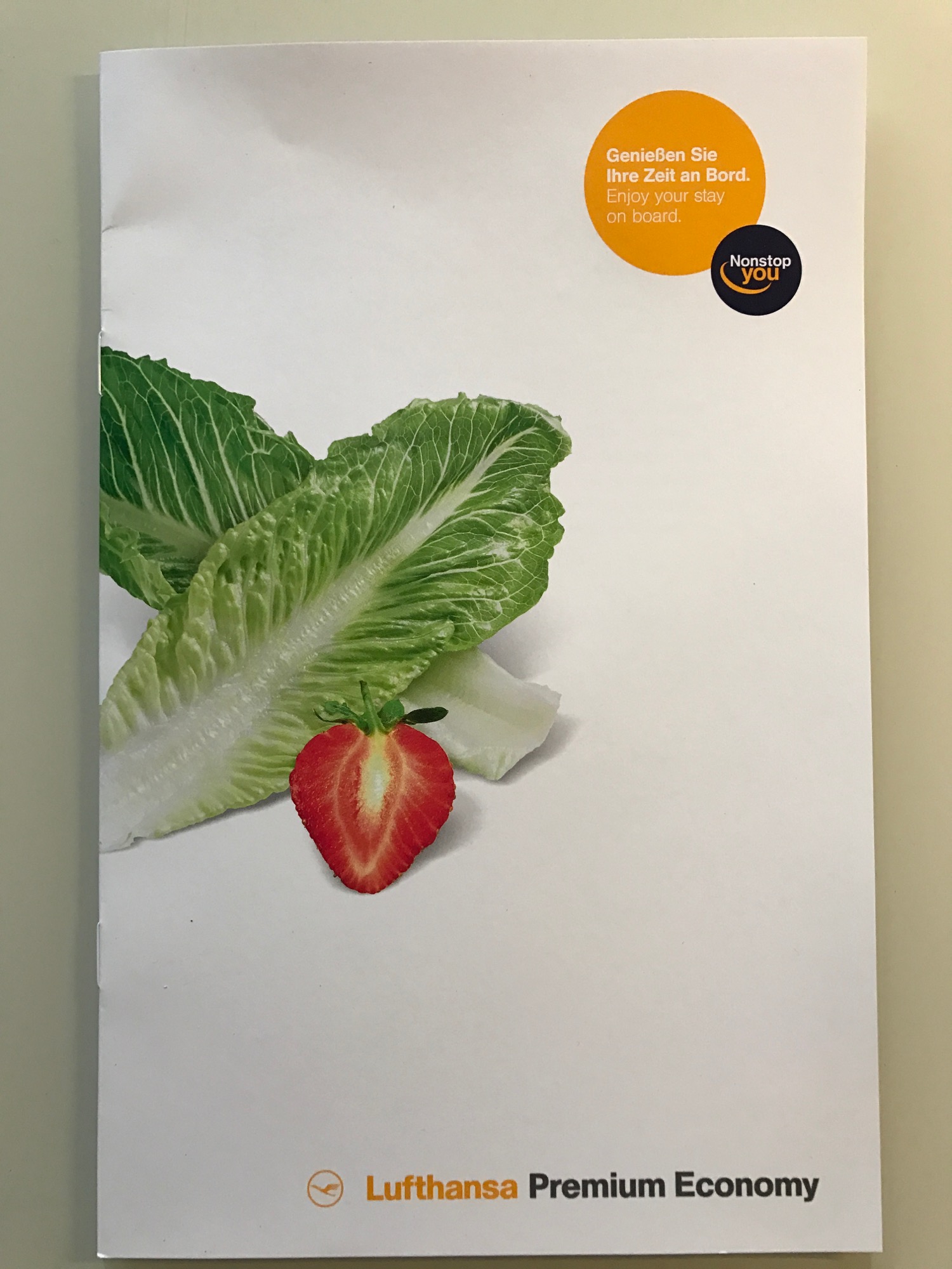 a white paper with a picture of a strawberry and lettuce