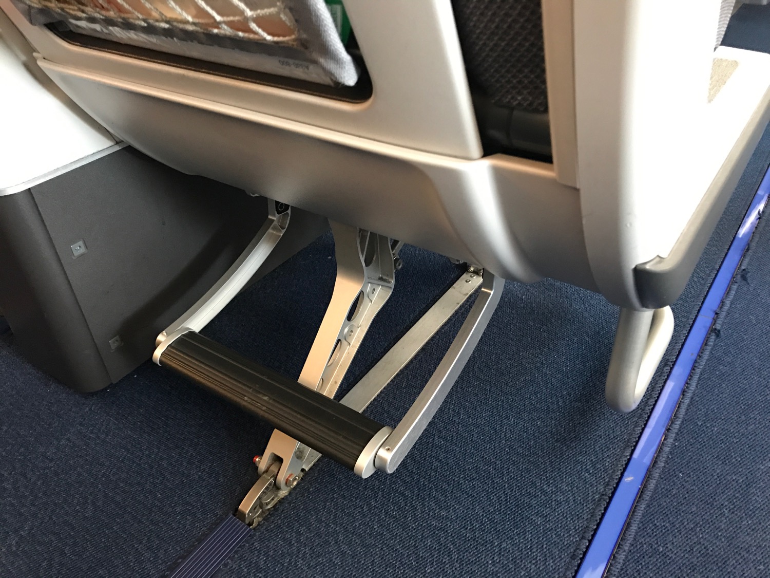a metal pedals on a seat