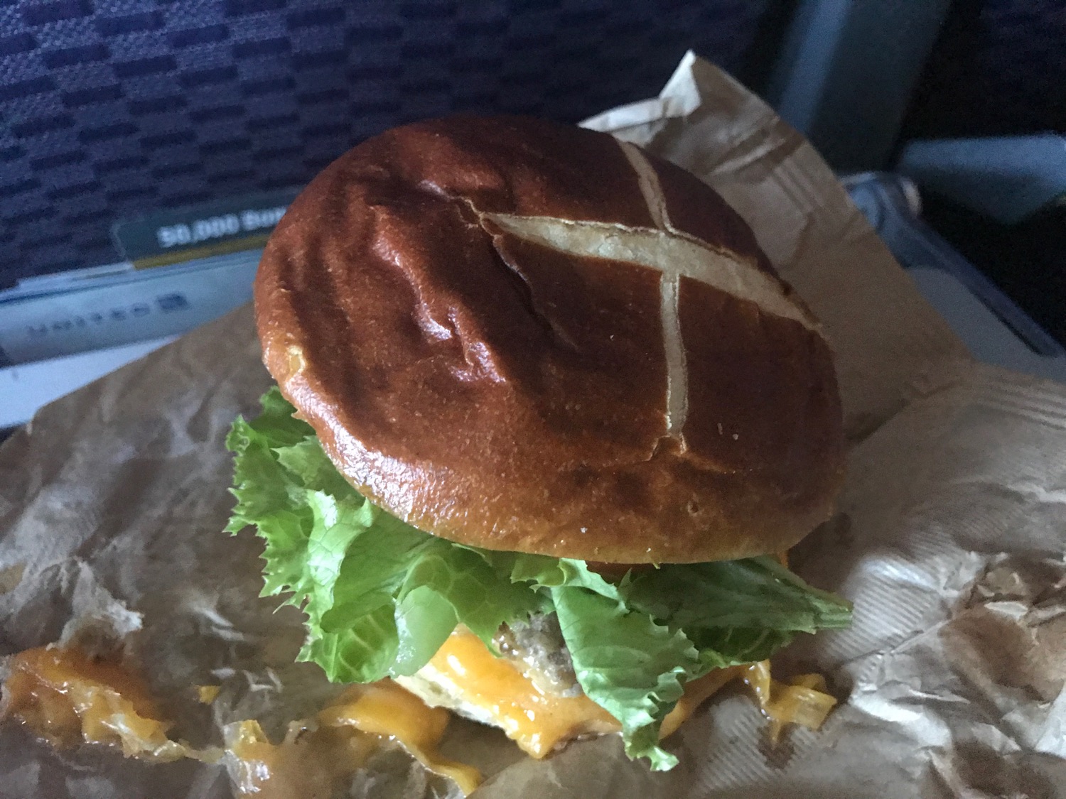 a burger on a paper wrapper