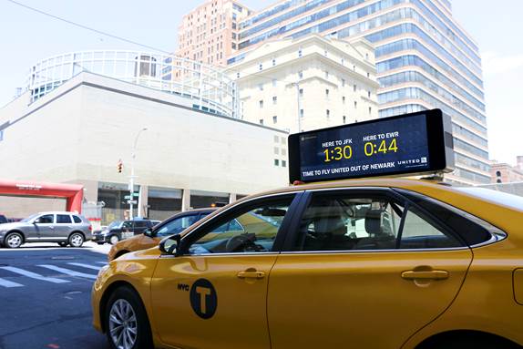a taxi cab on a street