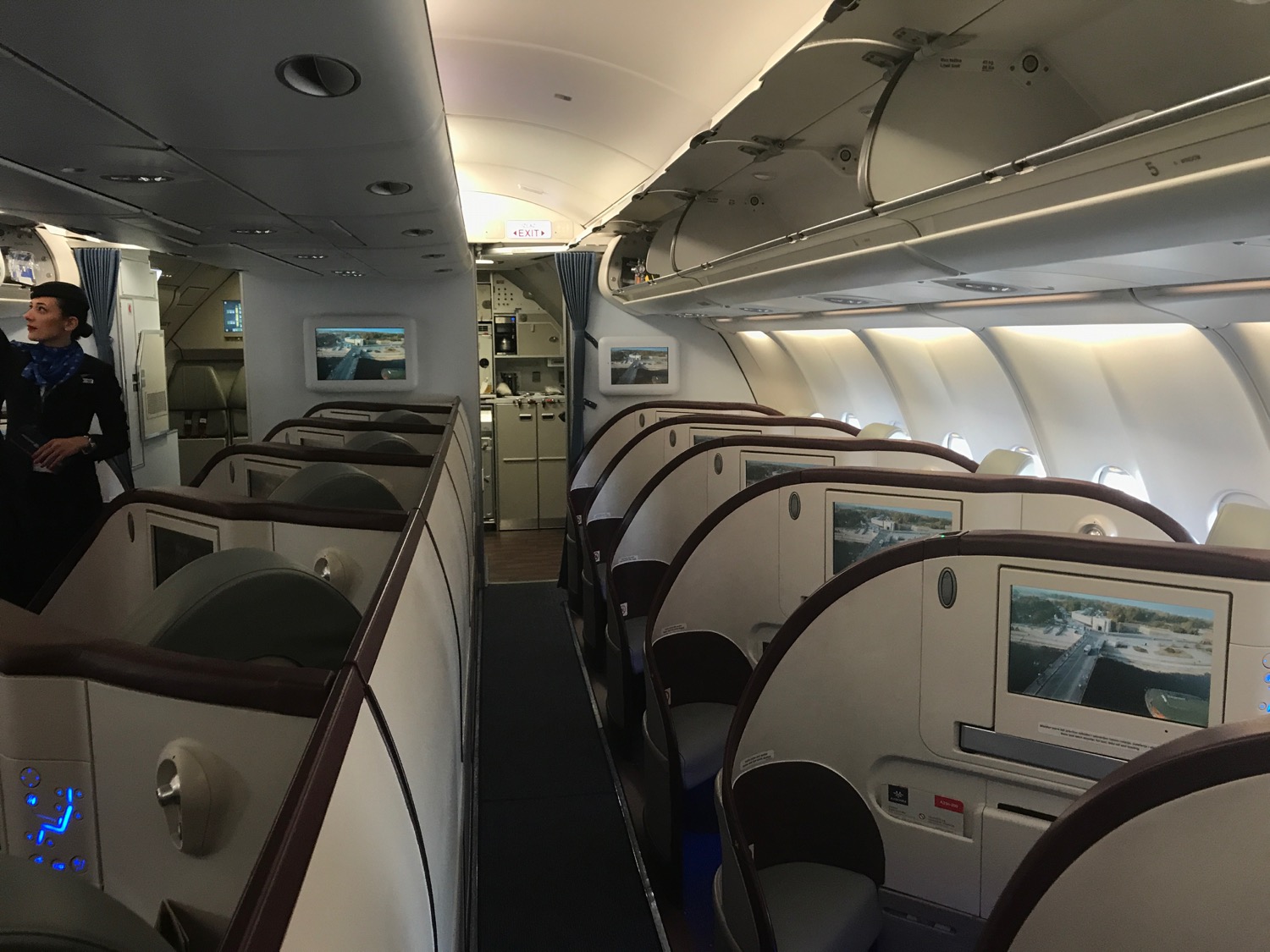 an airplane with seats and screens