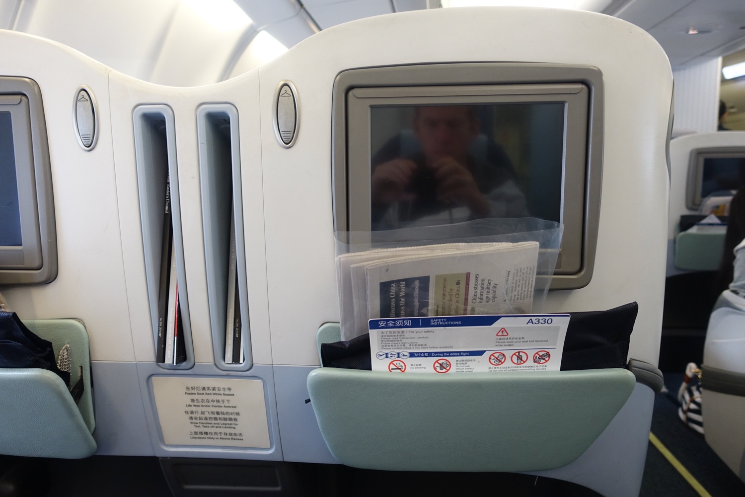 a screen with a screen in the back of a seat