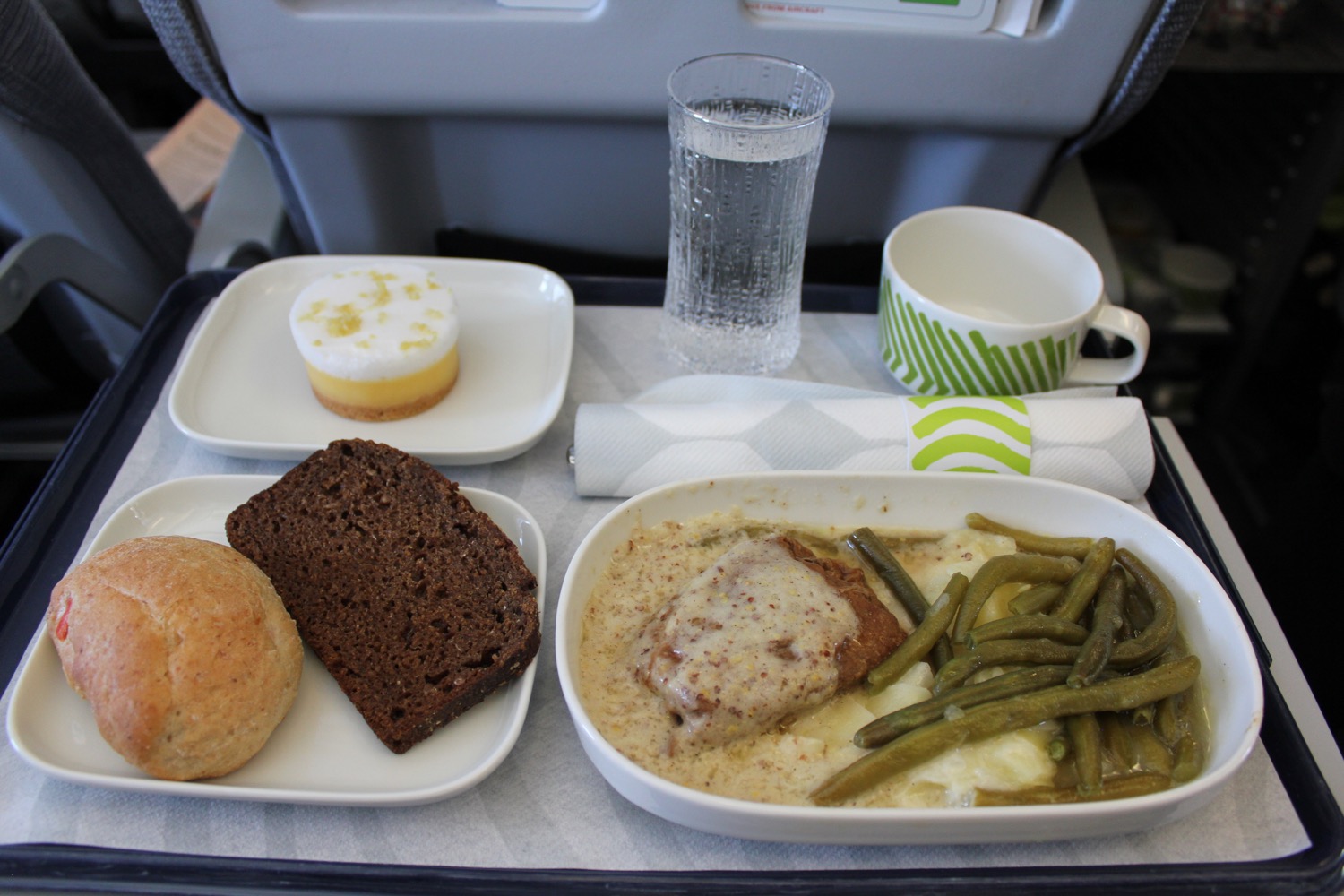 a tray of food on a plane