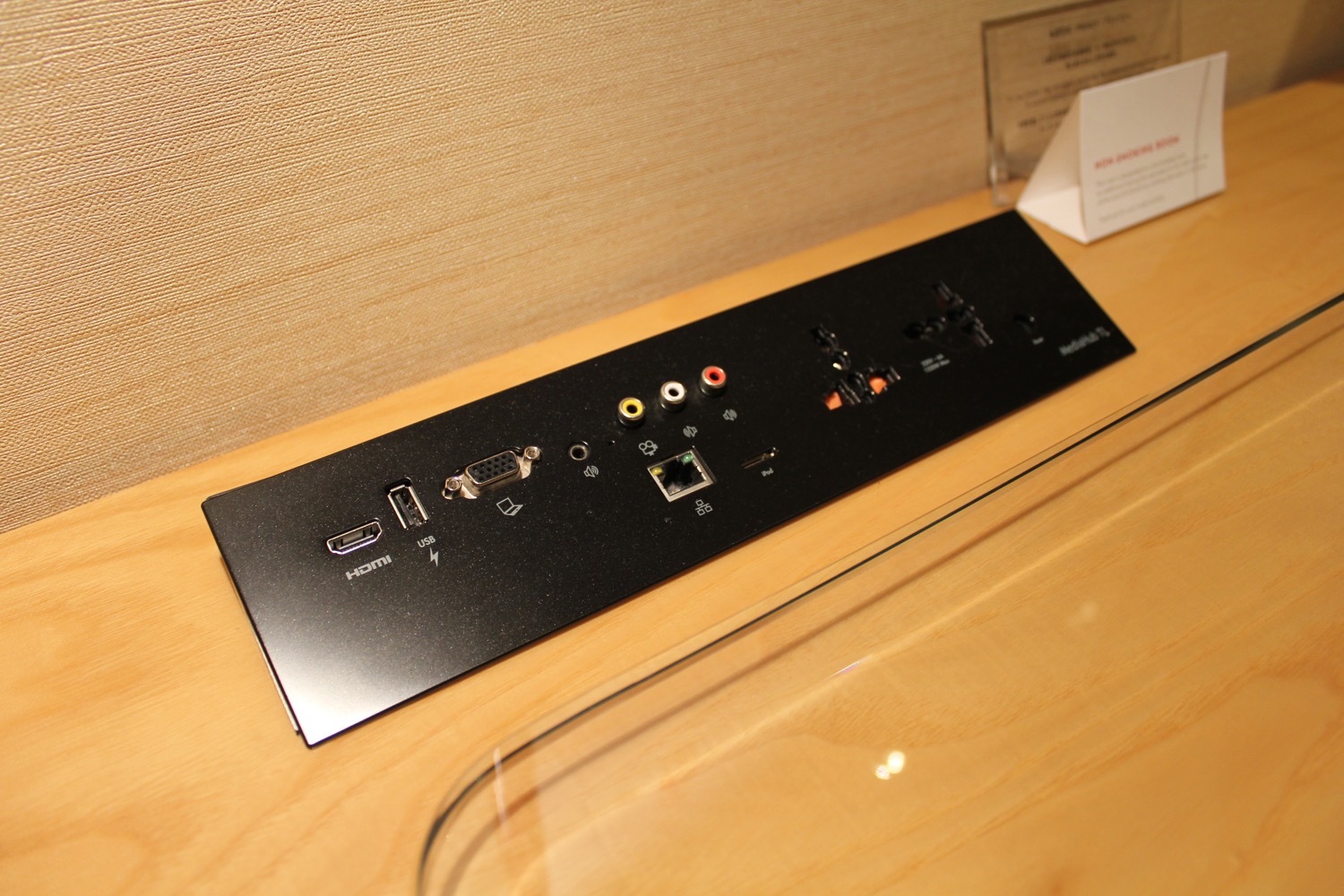 a black rectangular object with ports and wires