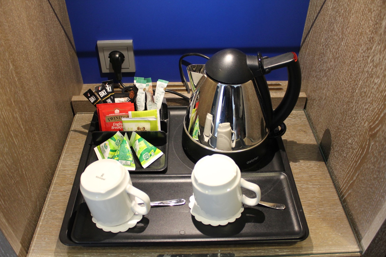 a tray with teapot and cups on it