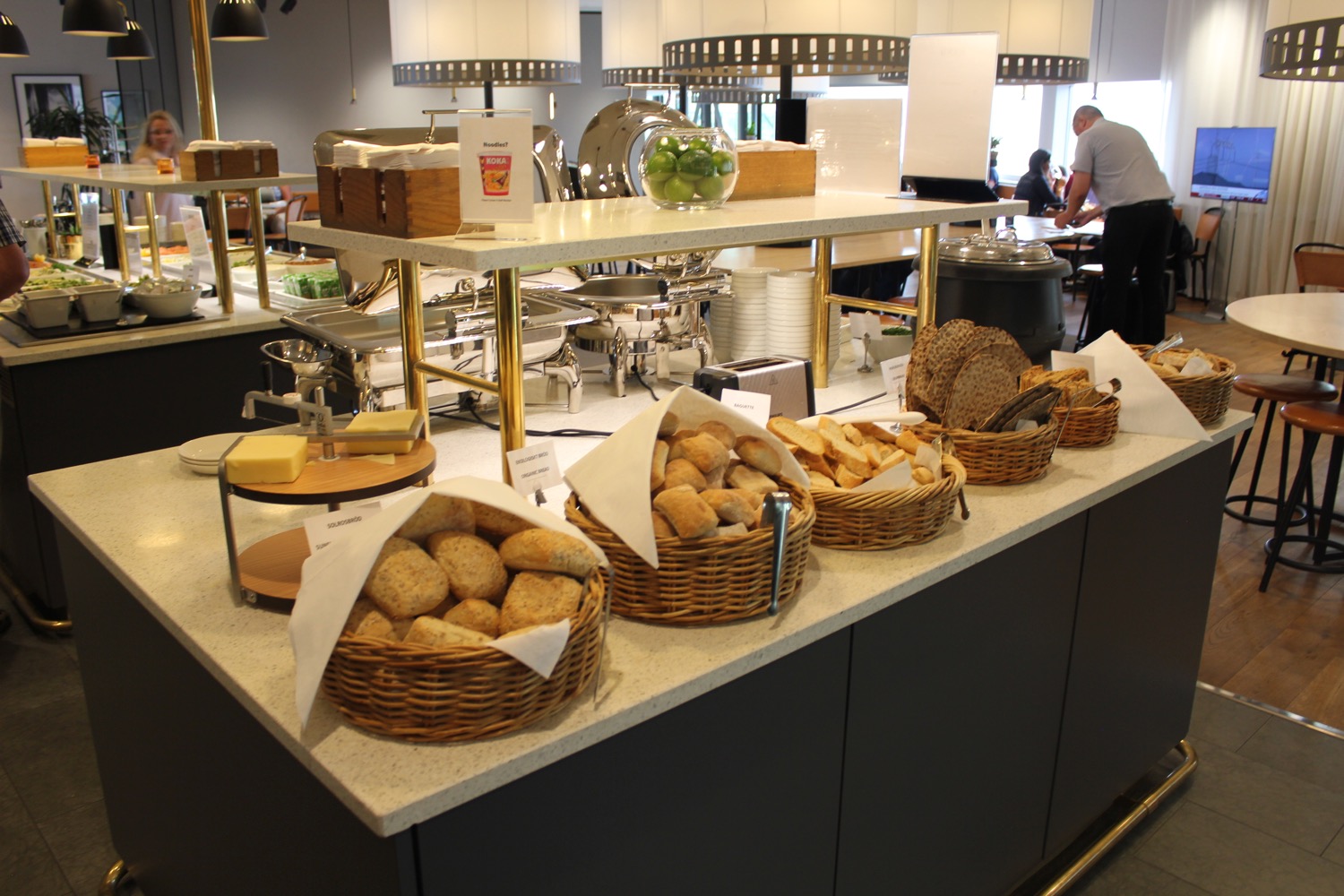 a group of baskets of bread on a counter